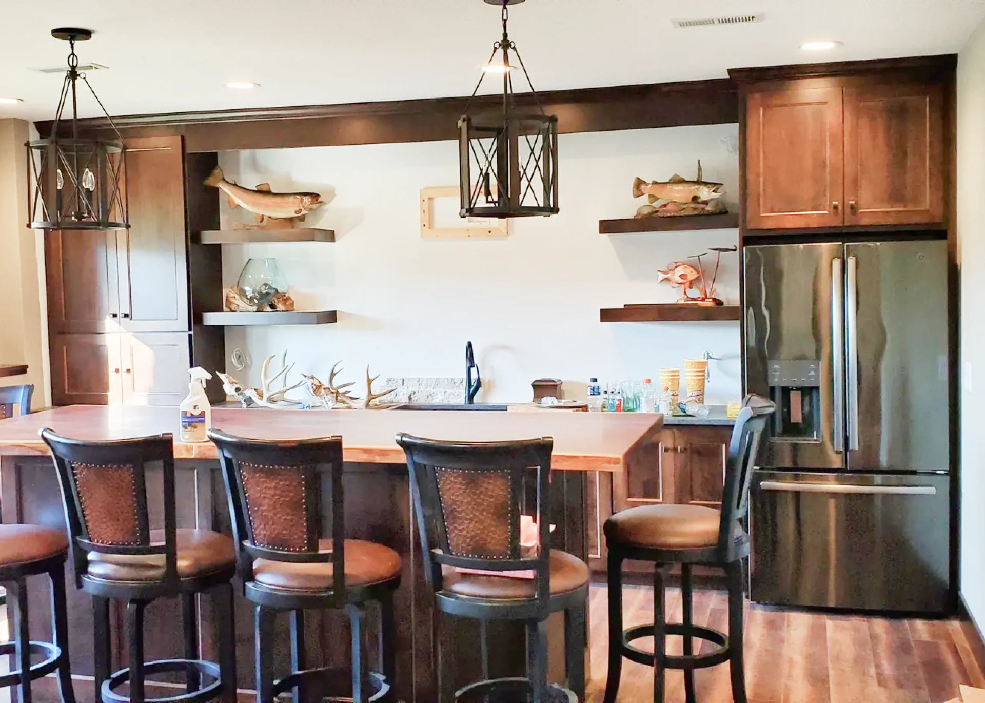 Contemporary bar area with pendant lights